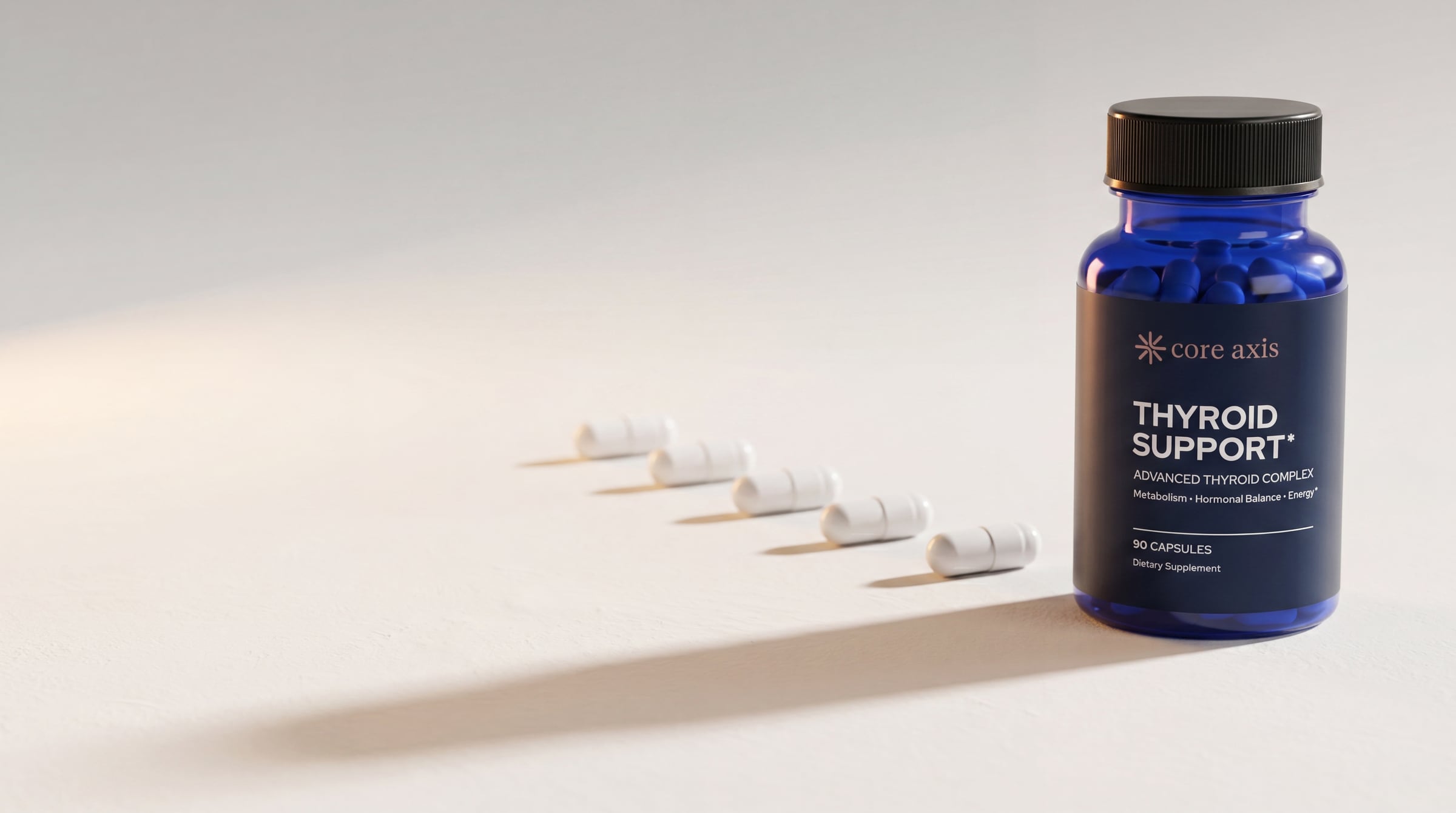 Core Axis Thyroid Support — bottle in hand against a soft chalk background